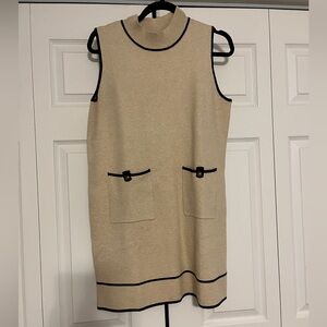 Elegant Tan Sleeveless Dress with Black Trim